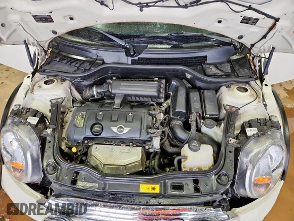 2012 MINI Hardtop z VIN WMWSU3C54CT543437, wystawiony jako Copart lot #60613355 z przebiegiem 43 932 mil mil oraz Szkoda całkowita • Salvage title. Historia ofert i sprzedaży dostępna na DreamBid. Obrazek 11.