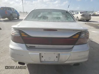 2003 Pontiac Bonneville SLE z VIN 1G2HY54K334173324, wystawiony jako Copart lot #78175394 z przebiegiem 130 829 mil mil oraz Szkoda całkowita • Salvage title. Historia ofert i sprzedaży dostępna na DreamBid. Obrazek 6.