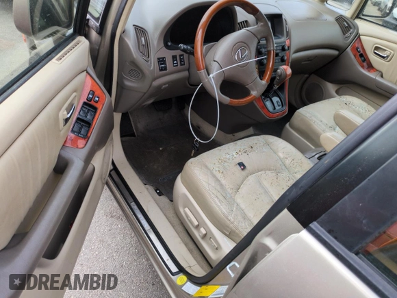 2002 Lexus RX 300 z VIN JTJHF10U220275170, wystawiony jako Copart lot #74442794 z przebiegiem Nie podano mil oraz Szkoda całkowita • Salvage title. Historia ofert i sprzedaży dostępna na DreamBid. Obrazek 8.