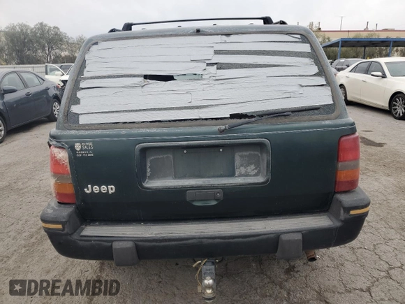 1993 Jeep Grand Cherokee Laredo with VIN 1J4GZ58S7PC125040, listed as a Copart auction lot 78846954 with 149,531 mi miles and Salvage Title. Bid and sale history available at carsss.com. Image 6.