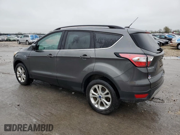 2018 Ford Escape SE with VIN 1FMCU9GD2JUA48491, listed as a Copart auction lot 51832565 with 207,422 mi miles and Salvage Title. Bid and sale history available at carsss.com. Image 2.