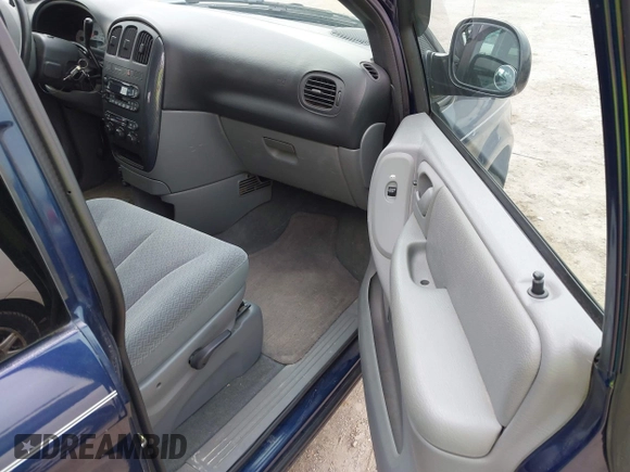 2005 Dodge Caravan SXT with VIN 2D4GP44L75R114843, listed as a IAAI auction lot 41644975 with 128,767 mi miles and . Bid and sale history available at DreamBid. Image 5.