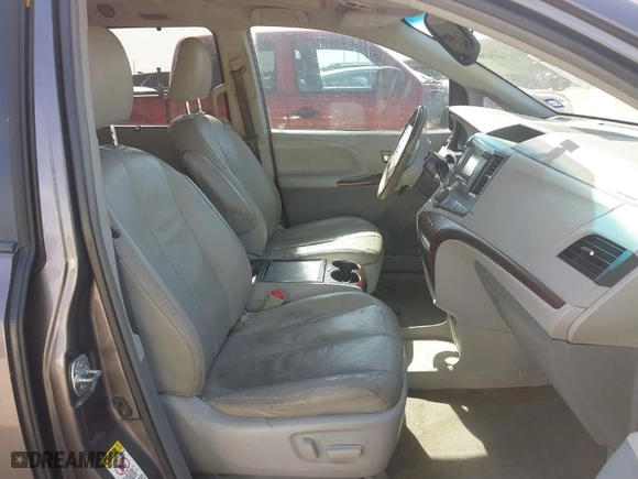 2012 Toyota Sienna XLE AAS with VIN 5TDYK3DC4CS216695, listed as a IAAI auction lot 41731768 with 186,362 mi miles. Bid and sale history available at carsss.com. Image 5.
