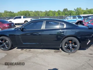 2012 Dodge Charger SXT with VIN 2C3CDXHG2CH258844, listed as a IAAI auction lot 42025908 with 214,529 mi miles. Bid and sale history available at carsss.com. Image 14.