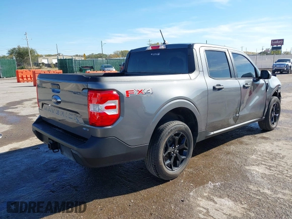 2023 Ford Maverick XL with VIN 3FTTW8F95PRA08573, listed as a IAAI auction lot 40741621 with 50,702 mi miles and . Bid and sale history available at DreamBid. Image 4.