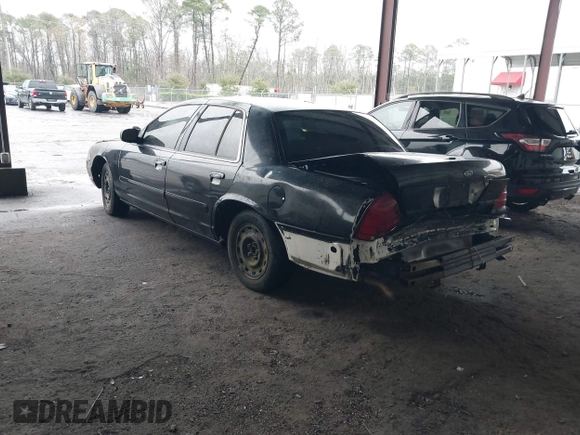 2000 Ford Crown Victoria Police Interceptor z VIN 2FAFP71W4YX199199, wystawiony jako IAAI lot #41610176 z przebiegiem 202 131 mil mil oraz . Historia ofert i sprzedaży dostępna na DreamBid. Obrazek 3.