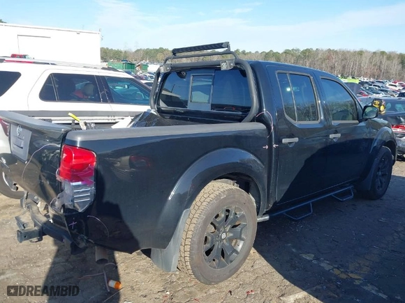 2018 Nissan Frontier SV V6 with VIN 1N6AD0ER8JN757407, listed as a IAAI auction lot 41734636 with 63,012 mi miles. Bid and sale history available at carsss.com. Image 4.