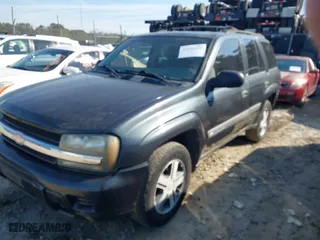 2004 Chevrolet TrailBlazer LS with VIN 1GNDT13S642447302, listed as a IAAI auction lot 41642656 with 181,297 mi miles. Bid and sale history available at carsss.com. Image 2.