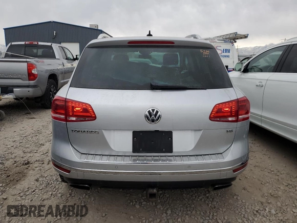 2016 Volkswagen Touareg Sport with VIN WVGEF9BP4GD010645, listed as a Copart auction lot 43271015 with 52,803 mi miles and Salvage Title. Bid and sale history available at DreamBid. Image 6.
