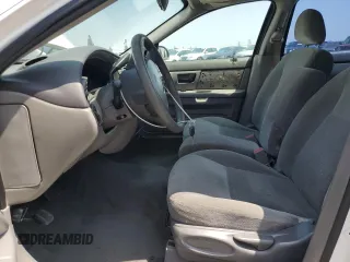 2006 Ford Taurus SE with VIN 1FAFP53U96A104173, listed as a Copart auction lot 59624865 with 145,005 mi miles and Salvage title. Bid and sale history available at DreamBid. Image 7.