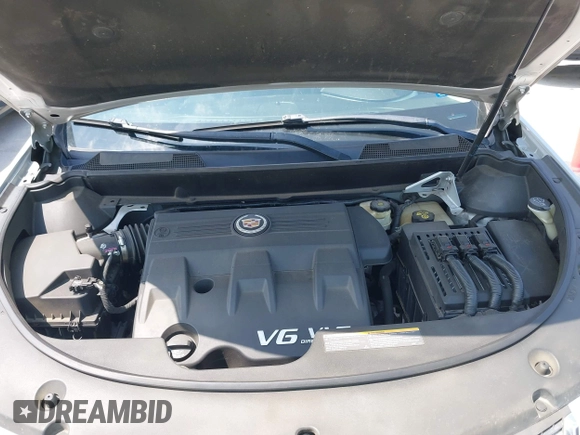 2011 Cadillac SRX Premium Collection with VIN 3GYFNCEY2BS594415, listed as a IAAI auction lot 42042854 with 130,894 mi miles and . Bid and sale history available at DreamBid. Image 10.