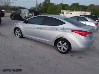 2013 Hyundai Elantra Limited PZEV with VIN 5NPDH4AE7DH352285, listed as a IAAI auction lot 41800551 with 120,171 mi miles. Bid and sale history available at carsss.com. Image 3.
