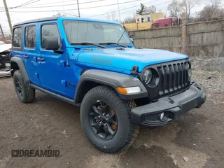 2022 Jeep Wrangler Unlimited Sport S z VIN 1C4HJXDG9NW116270, wystawiony jako IAAI lot #41227700 z przebiegiem 40 181 mil mil oraz . Historia ofert i sprzedaży dostępna na DreamBid. Obrazek 1.