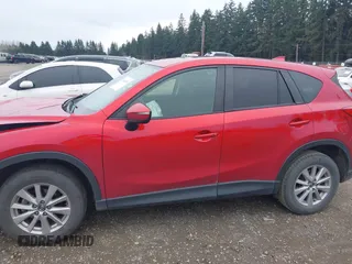 2016 Mazda CX-5 Touring with VIN JM3KE4CY2G0894930, listed as a IAAI auction lot 41906809 with 123,125 mi miles. Bid and sale history available at carsss.com. Image 14.