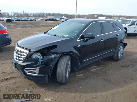 2019 Cadillac XT5 Luxury AWD with VIN 1GYKNDRS5KZ172975, listed as a IAAI auction lot 41814397 with 63,563 mi miles and . Bid and sale history available at carsss.com. Image 17.