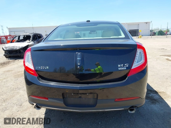 2013 Lincoln MKS z VIN 1LNHL9EK3DG617815, wystawiony jako IAAI lot #42239784 z przebiegiem 122 589 mil mil oraz . Historia ofert i sprzedaży dostępna na DreamBid. Obrazek 16.