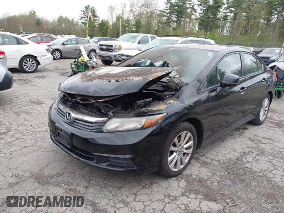 2012 Honda Civic EX with VIN 2HGFB2F84CH316659, listed as a IAAI auction lot 42217190 with 124,198 mi miles and . Bid and sale history available at DreamBid. Image 2.