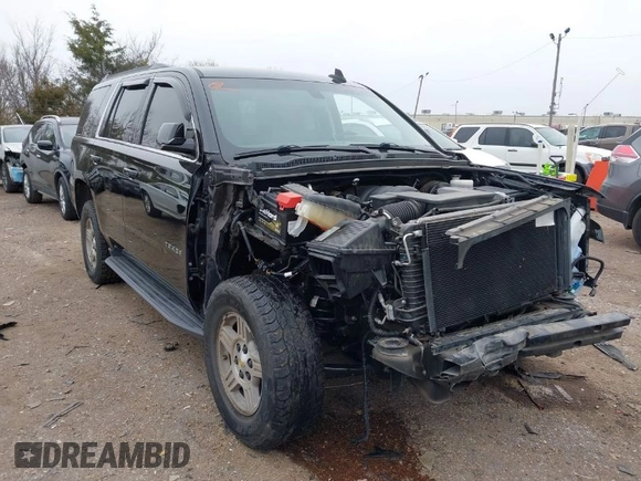 2020 Chevrolet Tahoe LS z VIN 1GNSCAKC1LR177807, wystawiony jako IAAI lot #41482578 z przebiegiem 75 010 mil mil oraz . Historia ofert i sprzedaży dostępna na DreamBid. Obrazek 1.