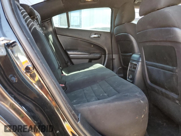 2013 Dodge Charger SE z VIN 2C3CDXBG6DH509939, wystawiony jako Copart lot #57851415 z przebiegiem 182 634 mil mil oraz Szkody całkowita. Historia ofert i sprzedaży dostępna na DreamBid. Obrazek 10.