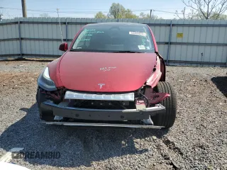 2025 Tesla Model Y Long Range z VIN 7SAYGDEE4SF260712, wystawiony jako Copart lot #54208975 z przebiegiem 1054 mil mil oraz Szkoda całkowita • Salvage title. Historia ofert i sprzedaży dostępna na DreamBid. Obrazek 5.