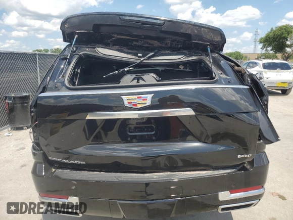 2025 Cadillac Escalade z VIN 1GYS9BRL7SR221143, wystawiony jako Copart lot #55594795 z przebiegiem 463 mil mil oraz Szkoda całkowita • Salvage title. Historia ofert i sprzedaży dostępna na DreamBid. Obrazek 6.