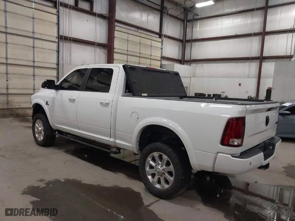 2018 Ram 2500 Laramie with VIN 3C6UR5FL1JG213467, listed as a IAAI auction lot 41513596 with 100,855 mi miles. Bid and sale history available at carsss.com. Image 3.