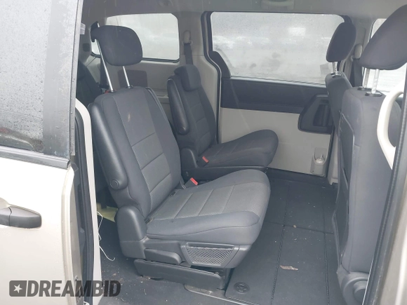 2008 Dodge Grand Caravan SE with VIN 1D8HN44H28B173855, listed as a IAAI auction lot 41968151 with 127,183 mi miles and . Bid and sale history available at DreamBid. Image 8.