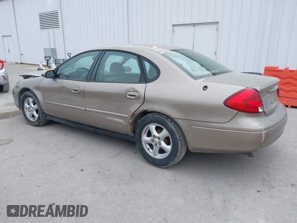 2002 Ford Taurus SES Standard with VIN 1FAFP55U52G135781, listed as a IAAI auction lot 41520037 with 196,207 mi miles. Bid and sale history available at carsss.com. Image 3.