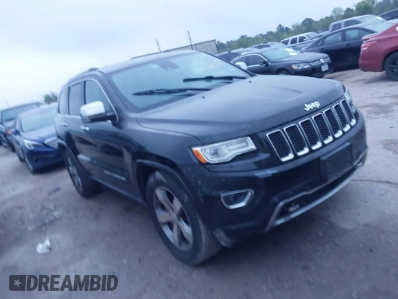 2015 Jeep Grand Cherokee High Altitude with VIN 1C4RJECG1FC654247, listed as a IAAI auction lot 41897014 with 204,630 mi miles. Bid and sale history available at carsss.com. Image 1.