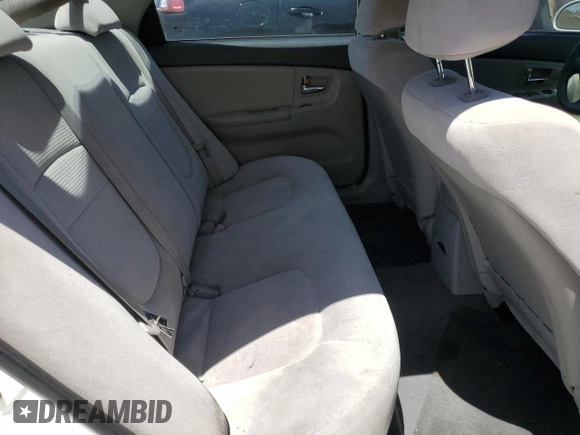 2008 Kia Spectra EX z VIN KNAFE121685506287, wystawiony jako Copart lot #58065295 z przebiegiem 181 686 mil mil oraz Szkoda całkowita • Salvage title. Historia ofert i sprzedaży dostępna na DreamBid. Obrazek 10.