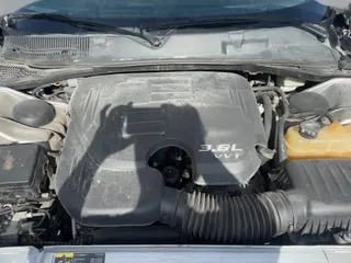 2015 Dodge Challenger SXT with VIN 2C3CDZAG6FH763960, listed as a Copart auction lot 63774775 with 106,858 mi miles and Salvage title. Bid and sale history available at DreamBid. Image 14.