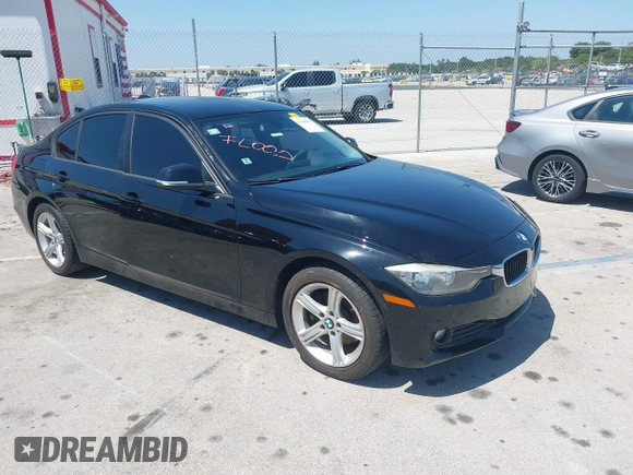 2014 BMW 3 Series 320i with VIN WBA3B1G54ENS79121, listed as a IAAI auction lot 41940001 with 41,835 mi miles. Bid and sale history available at carsss.com. Image 1.