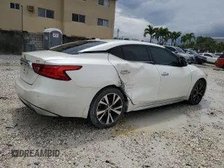 2017 Nissan Maxima SV with VIN 1N4AA6APXHC446995, listed as a Copart auction lot 51633115 with 56,949 mi miles and Salvage Title. Bid and sale history available at DreamBid. Image 3.