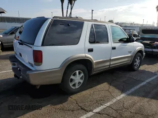 2000 Oldsmobile Bravada z VIN 1GHDT13W7Y2351268, wystawiony jako Copart lot #66408824 z przebiegiem 134 512 mil mil oraz Tytuł czysty. Historia ofert i sprzedaży dostępna na DreamBid. Obrazek 3.