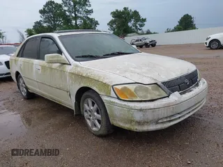 2001 Toyota Avalon XL z VIN 4T1BF28B31U182971, wystawiony jako IAAI lot #42276391 z przebiegiem 226 582 mil mil oraz . Historia ofert i sprzedaży dostępna na DreamBid. Obrazek 1.