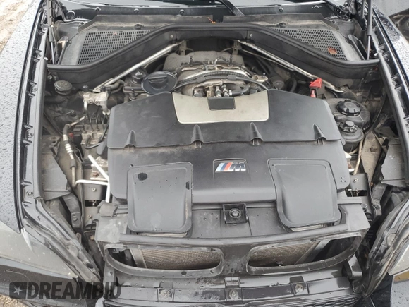 2012 BMW X5 M with VIN 5YMGY0C53CLK27448, listed as a Copart auction lot 80757454 with 146,435 mi miles and Salvage Title. Bid and sale history available at carsss.com. Image 12.