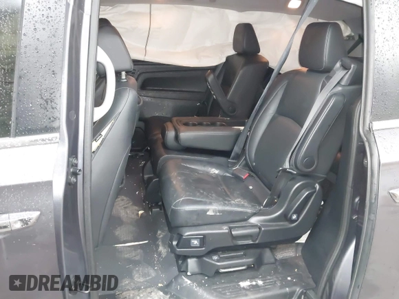 2021 Honda Odyssey Touring with VIN 5FNRL6H86MB026038, listed as a IAAI auction lot 41735249 with 68,480 mi miles. Bid and sale history available at carsss.com. Image 8.
