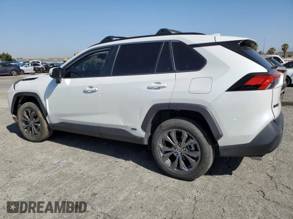 2024 Toyota RAV4 Hybrid XLE Premium with VIN JTMB6RFV6RD120633, listed as a Copart auction lot 57620825 with 28,817 mi miles and Salvage title. Bid and sale history available at DreamBid. Image 2.