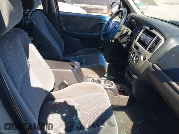 2004 Mazda Tribute LX with VIN 4F2YZ041X4KM23352, listed as a IAAI auction lot 41605357 with 276,243 mi miles and . Bid and sale history available at DreamBid. Image 5.