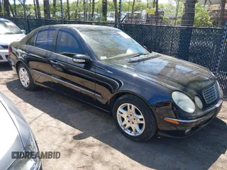 2005 Mercedes-Benz E-Class 3.2L with VIN WDBUF65J15A649830, listed as a IAAI auction lot 42062140 with 170,633 mi miles. Bid and sale history available at carsss.com. Image 1.