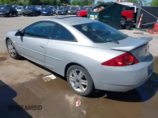 2002 Mercury Cougar z VIN 1ZWHT61L525621044, wystawiony jako IAAI lot #42300332 z przebiegiem 70 134 mil mil oraz . Historia ofert i sprzedaży dostępna na DreamBid. Obrazek 3.