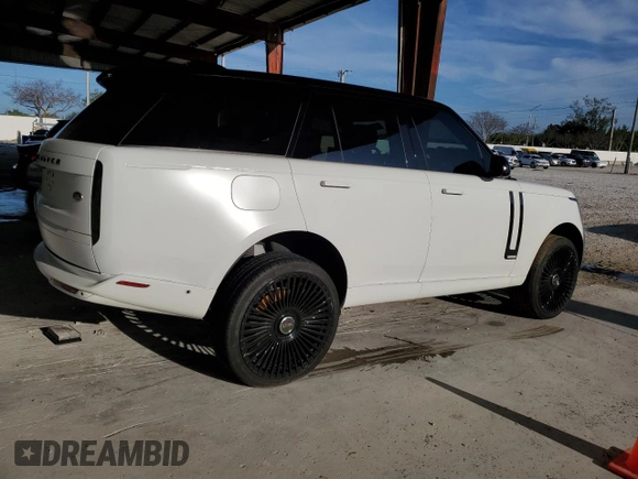 2023 Land Rover Range Rover Autobiography z VIN SALK19E7XPA021158, wystawiony jako Copart lot #60591304 z przebiegiem 4 976 mil mil oraz Nie do naprawy • Non repairable. Historia ofert i sprzedaży dostępna na DreamBid. Obrazek 3.