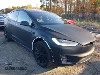 2020 Tesla Model X Long Range with VIN 5YJXCDE28LF298553, listed as a IAAI auction lot 40863184 with 54,031 mi miles. Bid and sale history available at carsss.com. Image 1.