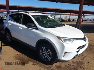 2018 Toyota RAV4 LE with VIN JTMZFREV6JJ203582, listed as a IAAI auction lot 41494455 with 85,897 mi miles. Bid and sale history available at carsss.com. Image 1.