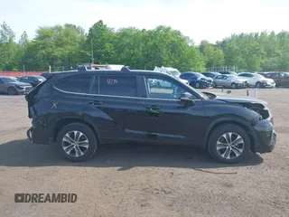 2023 Toyota Highlander L with VIN 5TDKDRBHXPS030361, listed as a IAAI auction lot 42230419 with 59,404 mi miles and . Bid and sale history available at DreamBid. Image 13.