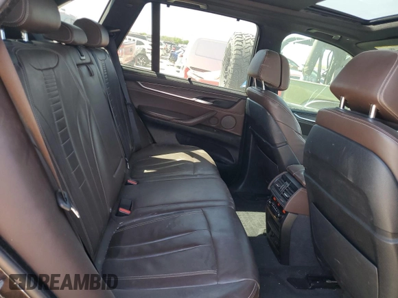 2017 BMW X5 xDrive50i z VIN 5UXKR6C39H0U13732, wystawiony jako Copart lot #49181165 z przebiegiem 129 644 mil mil oraz Szkoda całkowita • Salvage title. Historia ofert i sprzedaży dostępna na DreamBid. Obrazek 11.