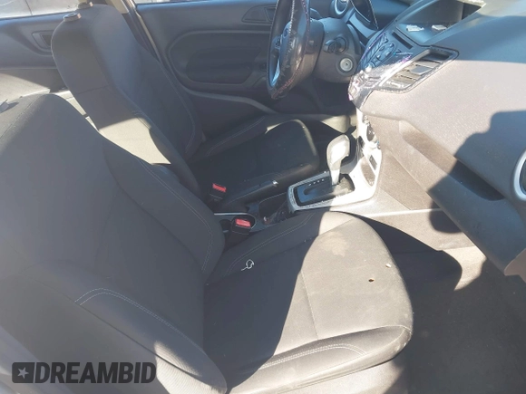 2017 Ford Fiesta SE z VIN 3FADP4BJXHM143658, wystawiony jako IAAI lot #41693045 z przebiegiem 142 361 mil mil oraz . Historia ofert i sprzedaży dostępna na DreamBid. Obrazek 5.