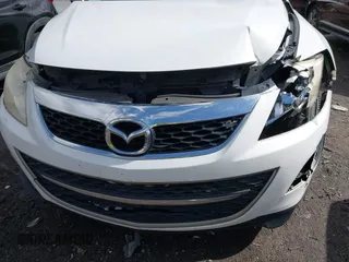2011 Mazda CX-9 Grand Touring with VIN JM3TB2DA8B0301776, listed as a IAAI auction lot 41582526 with 233,661 mi miles. Bid and sale history available at carsss.com. Image 6.