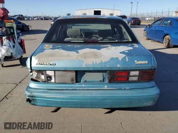 1994 Plymouth Sundance с VIN 1P3AP28K0RN197432, выставлен на аукционе Copart как лот 48218915 с пробегом 97 625 миль миль и Списание • Salvage title. История ставок и продаж доступна на DreamBid. Изображение 6.