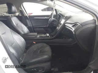 2019 Ford Fusion Titanium with VIN 3FA6P0K90KR236674, listed as a IAAI auction lot 42008633 with 99,737 mi miles and . Bid and sale history available at DreamBid. Image 5.